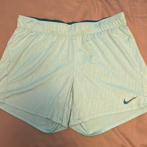 Nike shorts. Womens size Large. Blue/teal. Lightly worn.